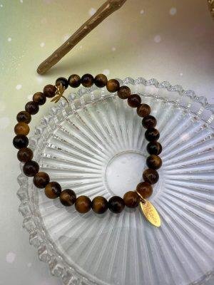 Bracelet élastique en pierres naturelles d’oeil de tigre avec pampille libellule dorée